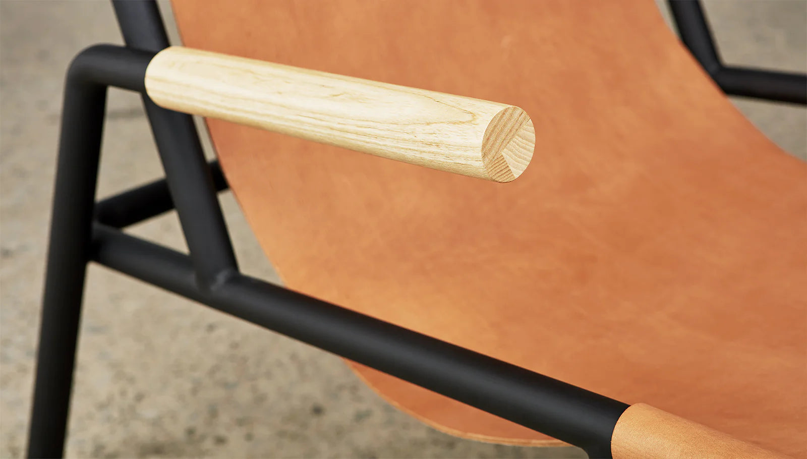 Wyatt Sling Chair | Floor Sample