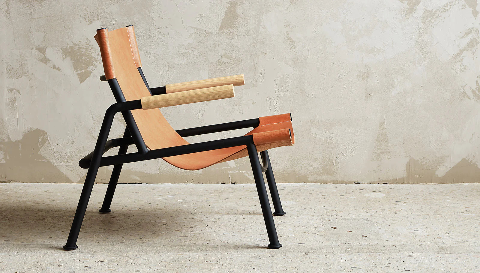 Wyatt Sling Chair | Floor Sample